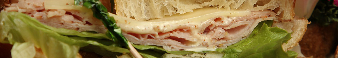 Eating Deli Sandwich at Meat Spot restaurant in Watertown, MA.